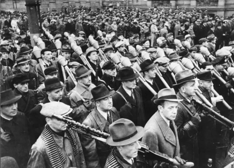 Ceremonious swearing-in of the volunteers of the Berliner Volkssturm. Today the solemn swearing-in of the volunteers of the German Volkssturm took place in Berlin. Image shows Volkssturm militia troops with their weapons during the march past Reich Minister for Public Enlightenment and Propaganda Dr. Goebbels.