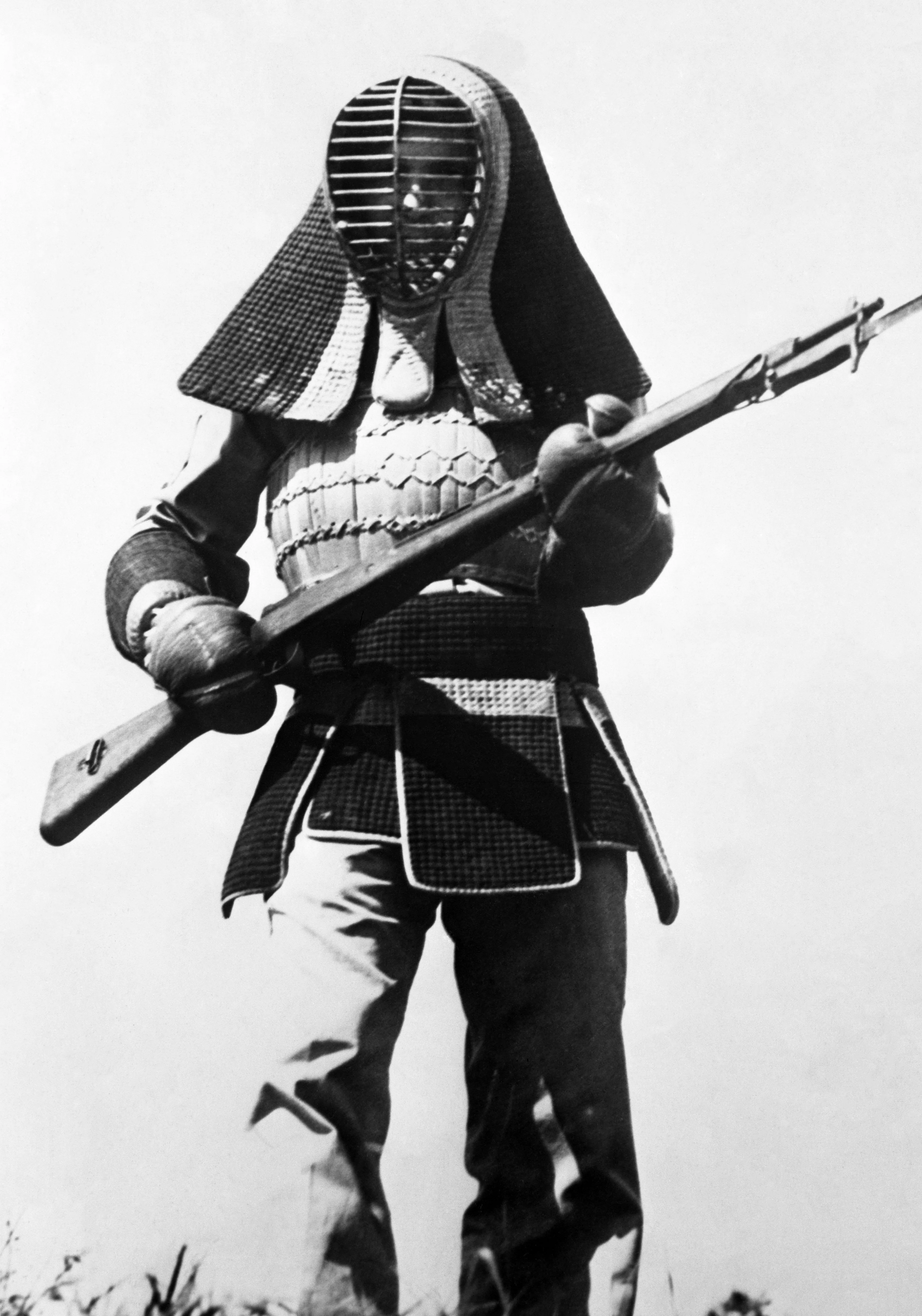 6th May 1944 TOPFOTO CODE: PD3001506 John Jones Jr. of East Springfield, Ohio, USA, demonstrates a Japanese bayonet-fighting suit worn at practice. Looking like medieval armour, it was captured at Kwajalein Island by troops of the U.S. Seventh Division. Sgt. Jones is holding a Japanese .38 Arisaka rifle; for bayonet practice the Japanese use a wooden replica of the same size. © Topfoto / Peter Deleuran | Used with exclusive permission.