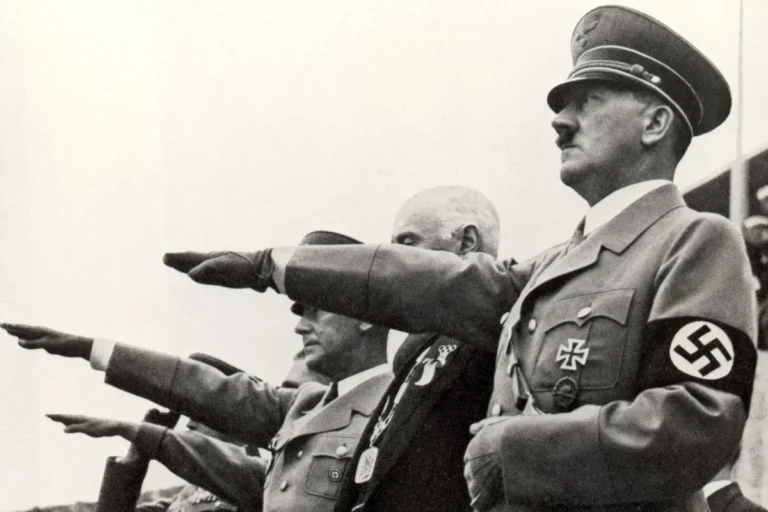 Adolf Hitler and his staff salute the teams during the opening ceremonies of the XI Olympic Games